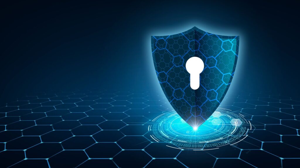 A glowing digital shield with a keyhole rises over a hexagonal grid, symbolizing major types of cyber security and data protection in a sleek, futuristic style.